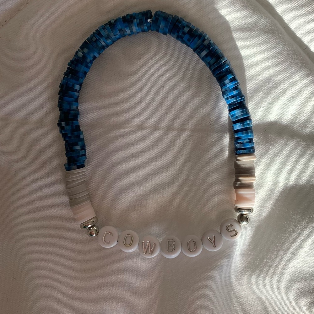 This is a cowboys bracelet and I can make it smaller and it’s homemade!